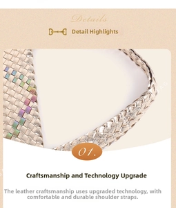 Detailed close-up of wide hand-woven shoulder strap with golden metallic texture leather