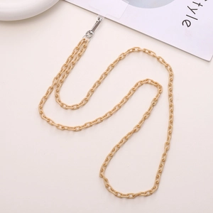 Detail of beige acrylic crossbody phone strap with durable metal clasp and connector