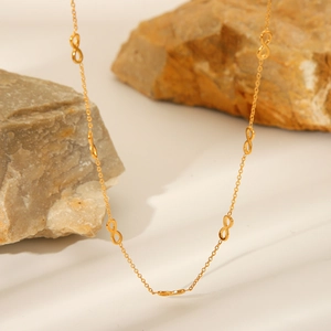 Elegant 18K gold plated stainless steel necklace featuring multiple infinity symbols