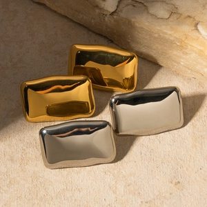 Polished rectangular geometric drop earrings in 18K gold and silver finish on stone