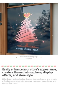 Pink hand-drawn Christmas tree window decal with Merry Christmas text on glass