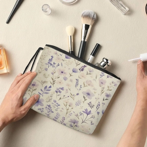 Floral makeup bag with watercolor flowers, black zipper, and wrist strap for storage