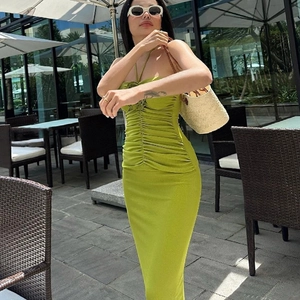 Lime green backless maxi dress with halter neck and ruching details for summer