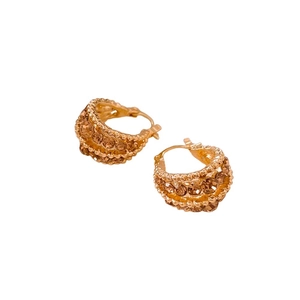 Elegant gold hoop earrings with sparkling rhinestones set in a curved luxury design