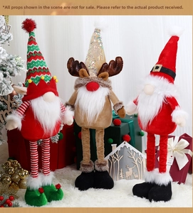 Three festive Christmas gnomes with telescopic long legs including reindeer and elf styles
