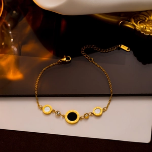 Elegant 18KGP gold chain bracelet with Roman numeral discs and black and white shell inlays