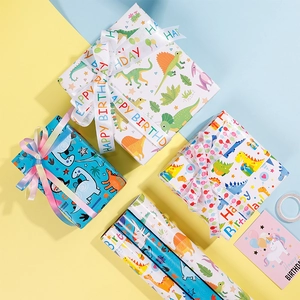Cartoon dinosaur gift wrapping paper set with Happy Birthday ribbon for kids birthday