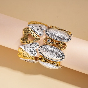Bracelet élastique bicolore en métal avec breloques cœurs gravés LOVE Laugh Live