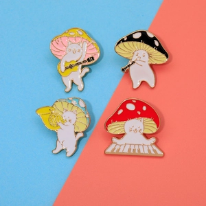 Detail showing four mushroom cat enamel pins playing musical instruments on vibrant background
