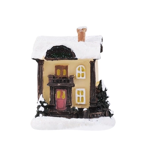 Miniature Christmas house decoration with white snow, red door and festive resin finish