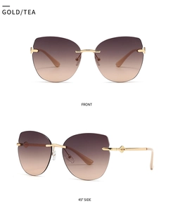 Detail view of gold rimless cat eye sunglasses with brown gradient lenses and metal hinges