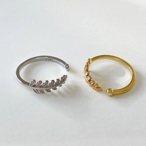 Minimalist 925 sterling silver and gold adjustable leaf rings in a wheat ear pattern