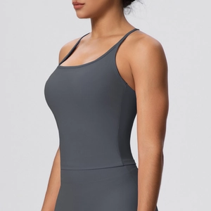 Detail of grey racerback sports bra with slim straps and high-elastic moisture-wicking fabric
