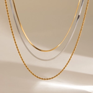 Layered gold rope chain and silver herringbone necklaces set for a stylish minimalist look