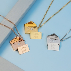 Envelope pendant necklaces in gold, silver and rose gold with Love You engraved letter card