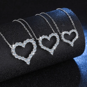 Three heart-shaped pendants with pave-set moissanite on silver O-chains for women
