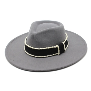 Detailed side view of a grey wool fedora hat featuring a beaded black ribbon band