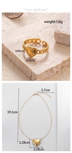 Detailed view of heart pendant necklace and chain ring set with size specifications