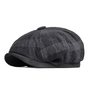 Retro grey plaid newsboy cap made of corduroy fabric for a classic British autumn look