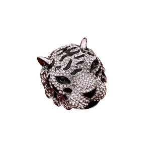 Vintage silver tiger head brooch with sparkling cubic zirconia and black enamel detail