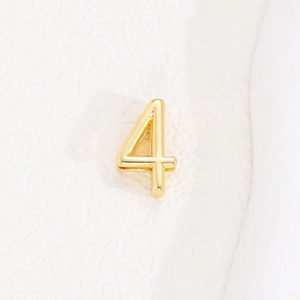 Detailed view of a shiny gold number 4 charm accessory for a 10mm mesh bracelet band