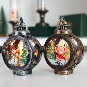 Vintage Christmas lantern ornaments with snowman and Santa scenes and LED light