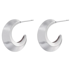 Macro shot of silver C-shaped hoop earrings with faceted geometric pleated texture