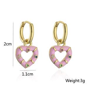 Detailed view of pink heart drop earrings with gold plating and colorful zircons