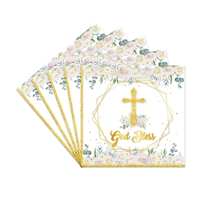 Close-up of God Bless napkins with gold glitter cross and floral rose design for baptism