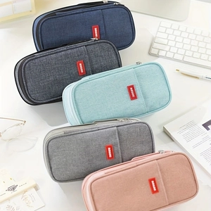 Group display of five large capacity macaron canvas pencil cases with side zipper design