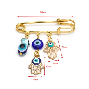 Detailed dimensions of Hamsa Hand and Evil Eye gold pin brooch with blue charms