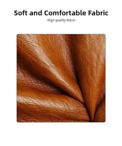 Close-up of soft brown leather texture with high quality natural grain and stitching
