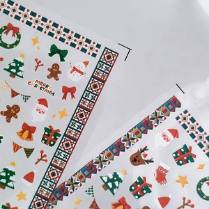 3D Christmas nail art stickers featuring Santa, trees, and gingerbread for festive DIY deco