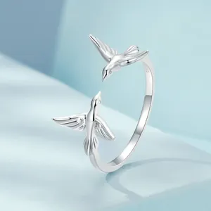 Adjustable S925 sterling silver ring featuring an elegant twin birds design for women