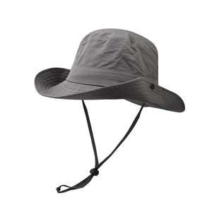 Detailed view of dark grey outdoor sun hat with adjustable drawstring and wide brim