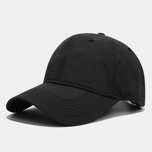 Side view of black quick-dry baseball cap with curved brim and breathable eyelets