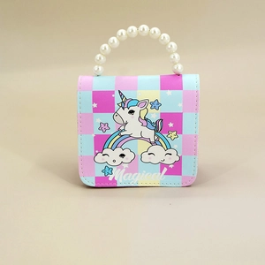 Detail of a pastel checkered kids bag with pearl handle and unicorn magical graphic