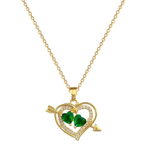 Luxurious gold arrow heart necklace with sparkling green stones and small zircons