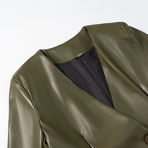 Detail of army green PU leather jacket showing V-neck design and button closure