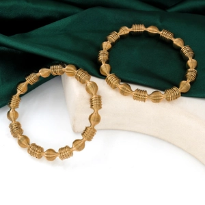 Golden spiral spring bracelets with hollow geometric texture on a minimalist stone base