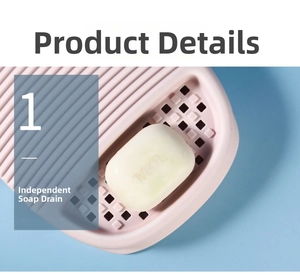 Pink soap dish with drainage holes and anti-slip ridges for laundry soap storage