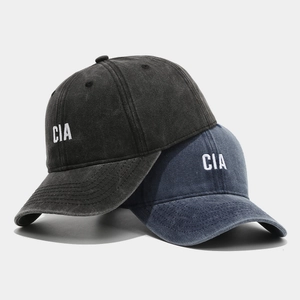 Washed cotton baseball caps with CIA embroidery in black and blue vintage style