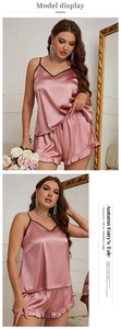 Detail of V-neck satin pajama set with lace trim and ruffled hem in dusty pink finish