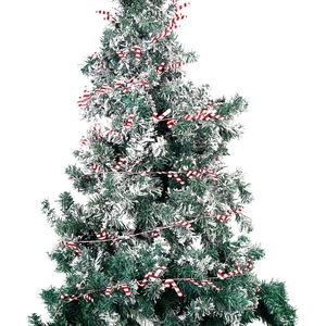 Close-up of red and white striped candy cane garland on a snowy Christmas tree