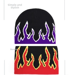 Detailed knit of beanie hats with flame jacquard patterns in purple and red colors