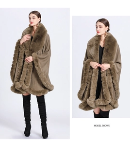Brown faux fur trim shawl poncho for women shown on model with black boots