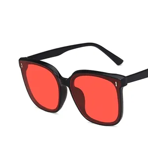 Classic black square frame sunglasses with vibrant red lenses and durable metal hinges
