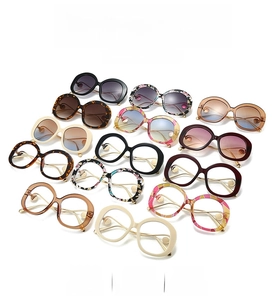 Collection of retro round pearl sunglasses in various colors with stylish metal temples
