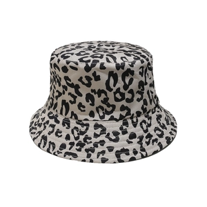 Close-up of black and white leopard print bucket hat with reinforced brim stitching