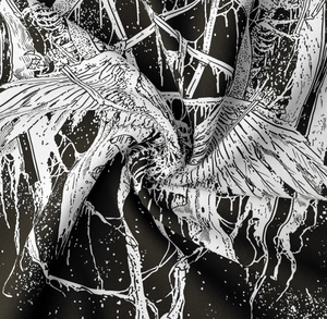 Close-up of artistic spiral fold on black and white skull tapestry showing fabric texture